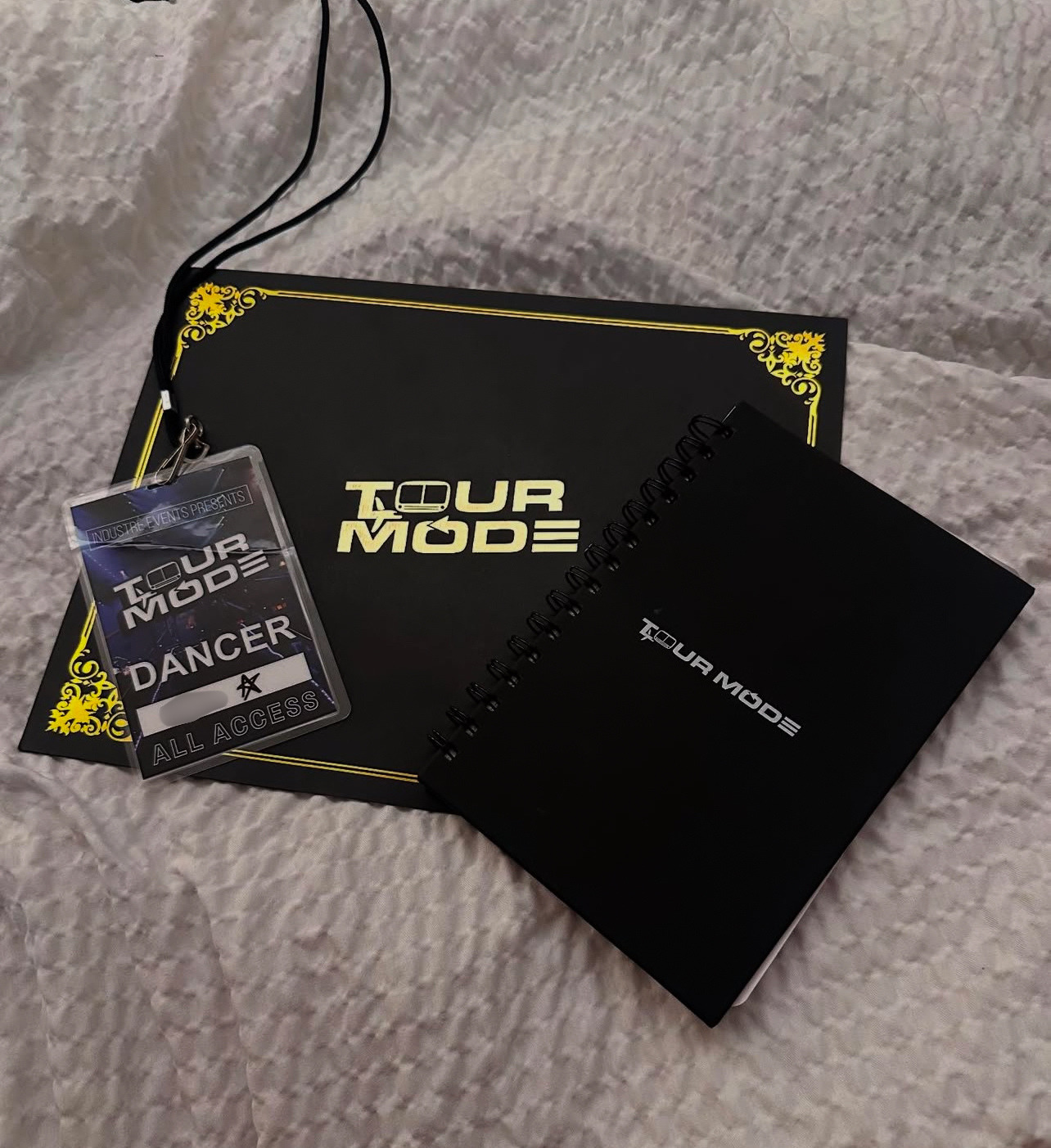 TOUR MODE credential, certificate and branded notebook from the program
